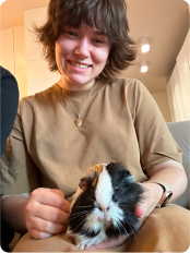 Girl holding a guinea pig